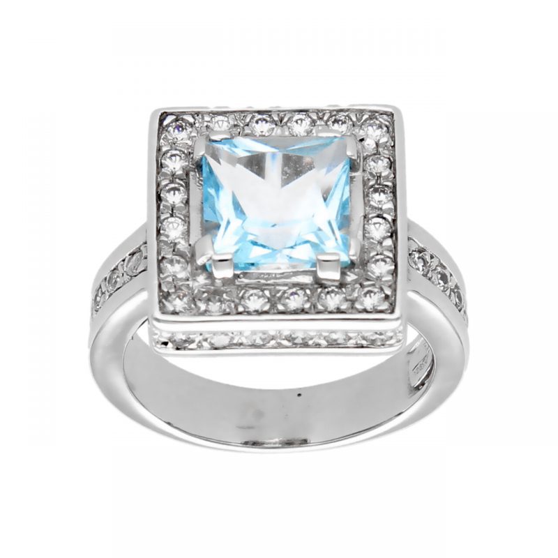 White gold ring with topaz and zircon