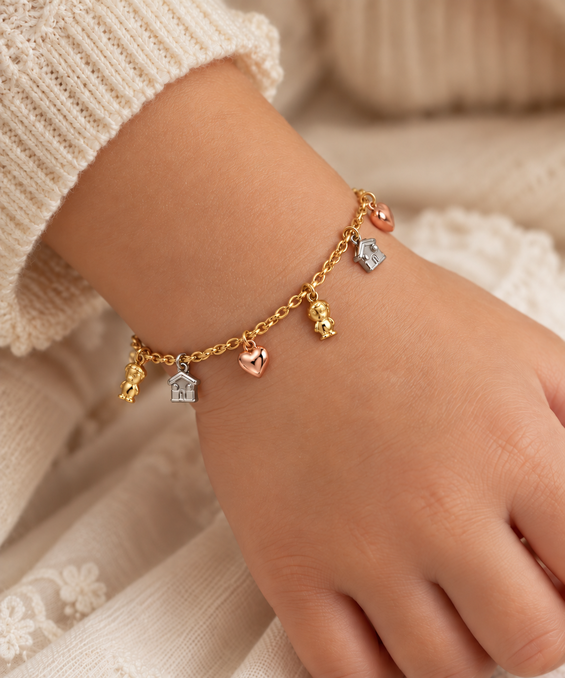 Bracciale bimbo in oro giallo e pendenti in tre ori_3