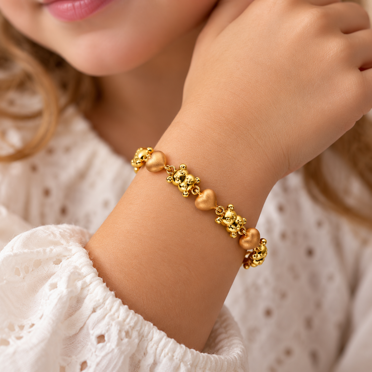 Bracciale in oro giallo e oro rosa con cuori e orsetti_3